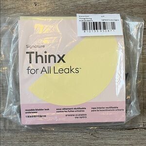Thinx Reusable Leak Thong/String Underwear — Pink and Yellow Packaging